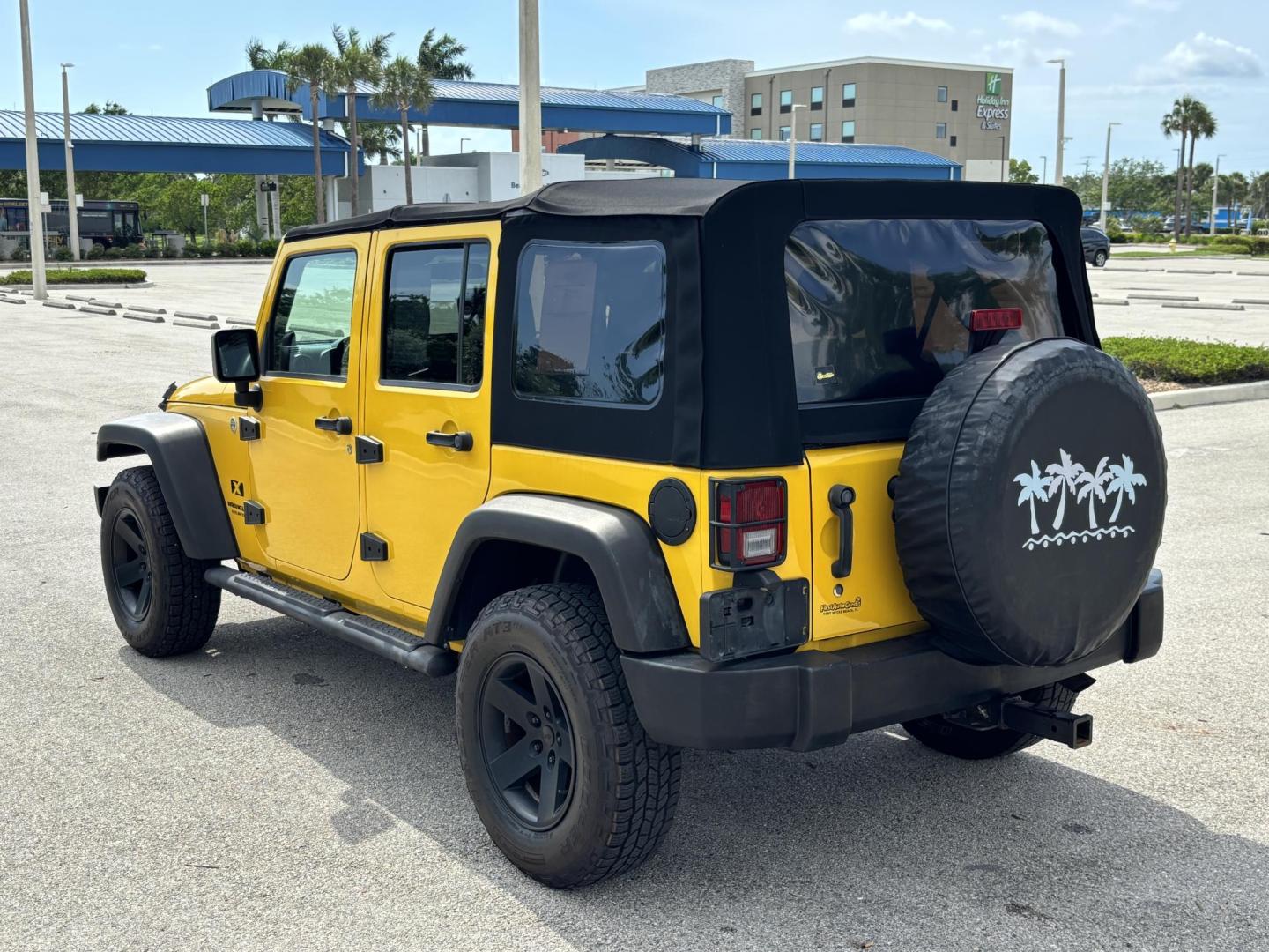 2008 YELLOW JEEP WRANGLER UNLIMI X (1J4GA39158L) with an 3.8L engine, 4-Speed Manual transmission, located at 11170 Summerlin Square Dr., Fort Myers Beach, FL, 33931, (239) 999-7777, 26.493546, -81.941628 - Manual Transmission New Cloth Top New Brakes New Rotors - Photo#4