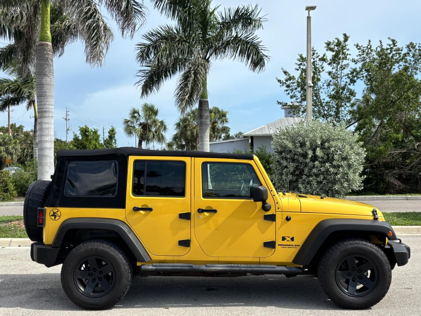 2008 YELLOW JEEP WRANGLER UNLIMI X (1J4GA39158L) with an 3.8L engine, 4-Speed Manual transmission, located at 11170 Summerlin Square Dr., Fort Myers Beach, FL, 33931, (239) 999-7777, 26.493546, -81.941628 - Manual Transmission New Cloth Top New Brakes New Rotors - Photo#3