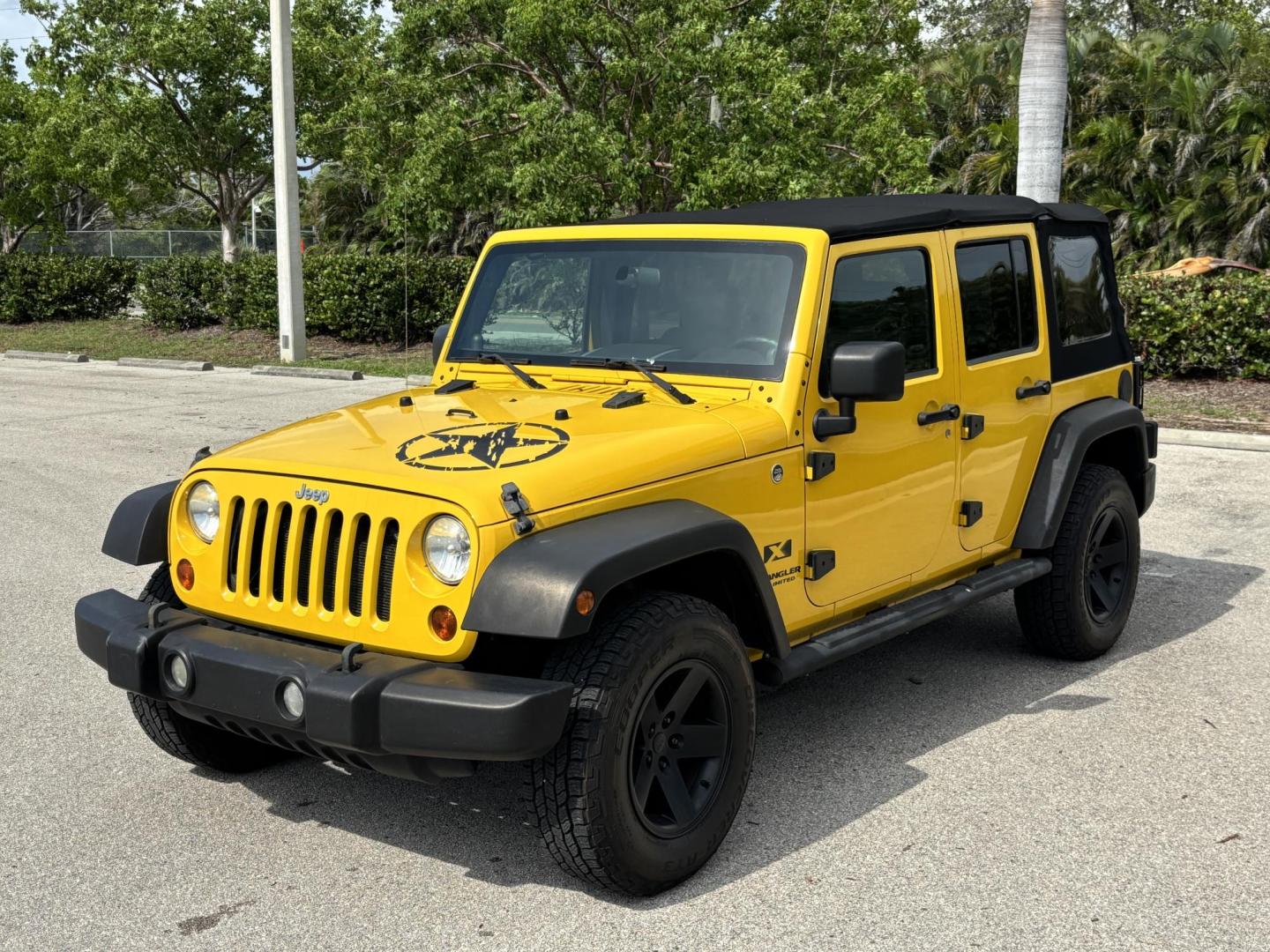 2008 YELLOW JEEP WRANGLER UNLIMI X (1J4GA39158L) with an 3.8L engine, 4-Speed Manual transmission, located at 11170 Summerlin Square Dr., Fort Myers Beach, FL, 33931, (239) 999-7777, 26.493546, -81.941628 - Manual Transmission New Cloth Top New Brakes New Rotors - Photo#0