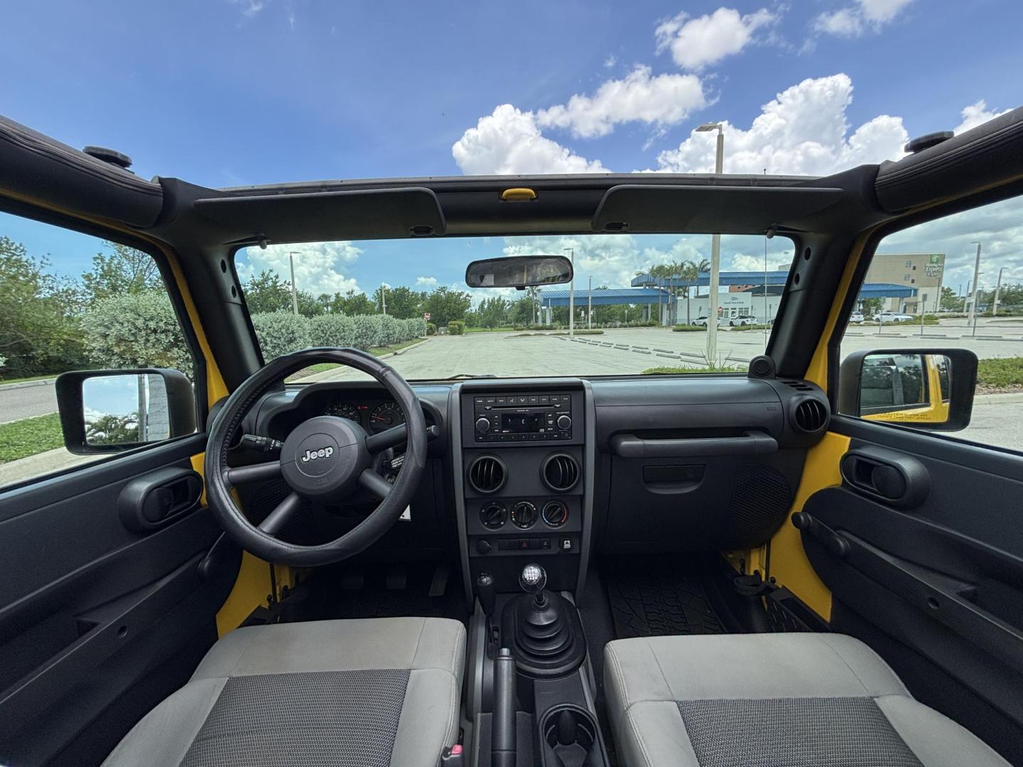 2008 YELLOW JEEP WRANGLER UNLIMI X (1J4GA39158L) with an 3.8L engine, 4-Speed Manual transmission, located at 11170 Summerlin Square Dr., Fort Myers Beach, FL, 33931, (239) 999-7777, 26.493546, -81.941628 - Manual Transmission New Cloth Top New Brakes New Rotors - Photo#12