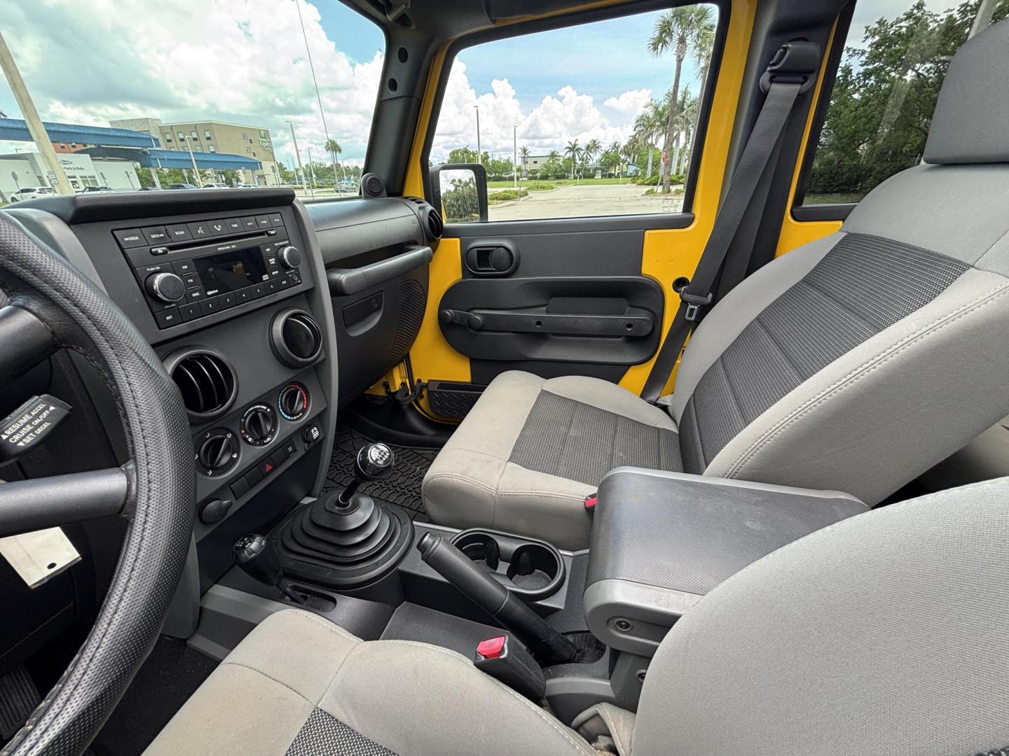 2008 YELLOW JEEP WRANGLER UNLIMI X (1J4GA39158L) with an 3.8L engine, 4-Speed Manual transmission, located at 11170 Summerlin Square Dr., Fort Myers Beach, FL, 33931, (239) 999-7777, 26.493546, -81.941628 - Manual Transmission New Cloth Top New Brakes New Rotors - Photo#15