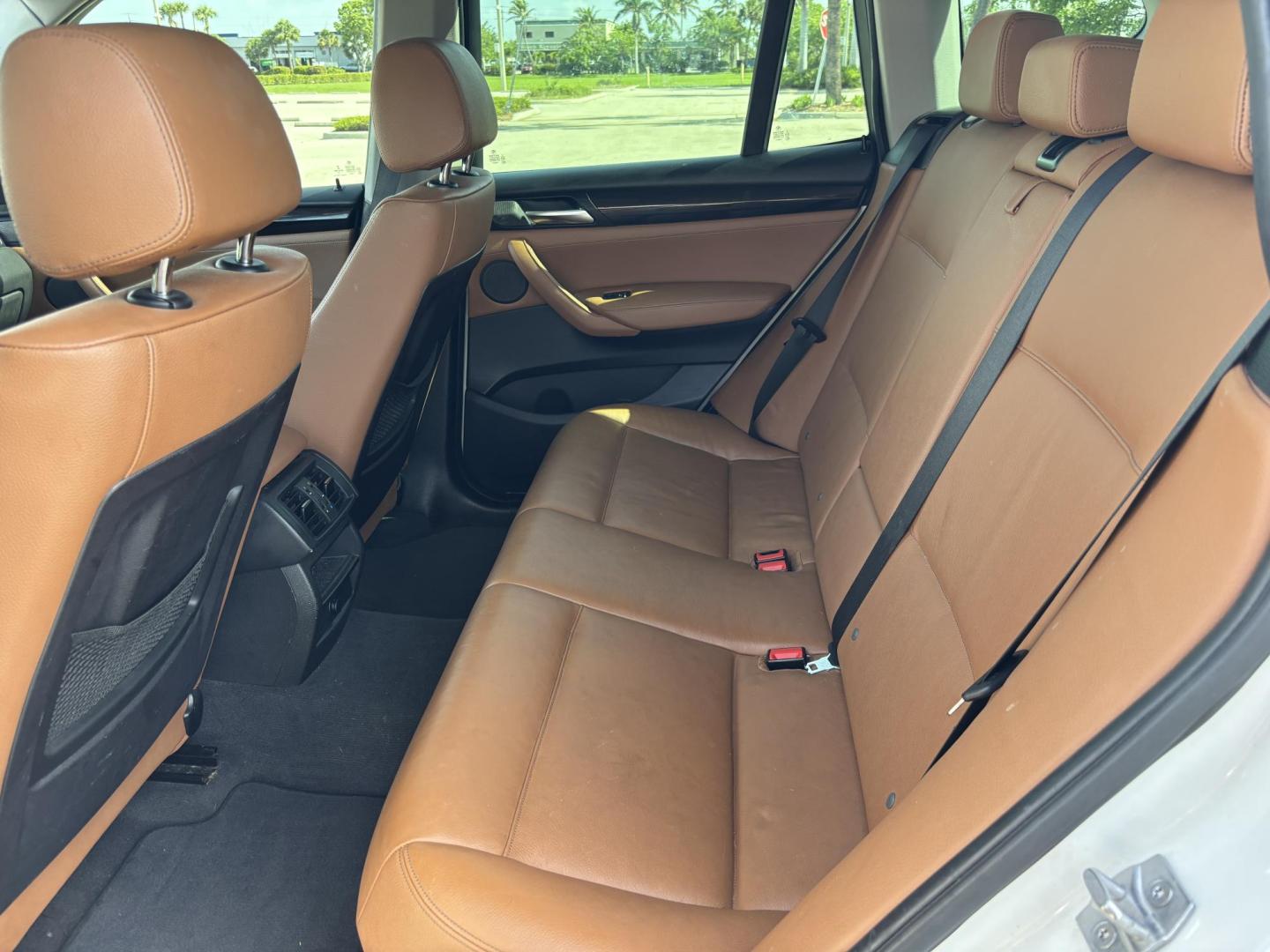 2016 WHITE BMW X3 xDrive28i (5UXWX9C5XG0) with an 2.0L L4 DOHC 16V engine, 8-Speed Automatic transmission, located at 11170 Summerlin Square Dr., Fort Myers Beach, FL, 33931, (239) 999-7777, 26.493546, -81.941628 - Photo#27