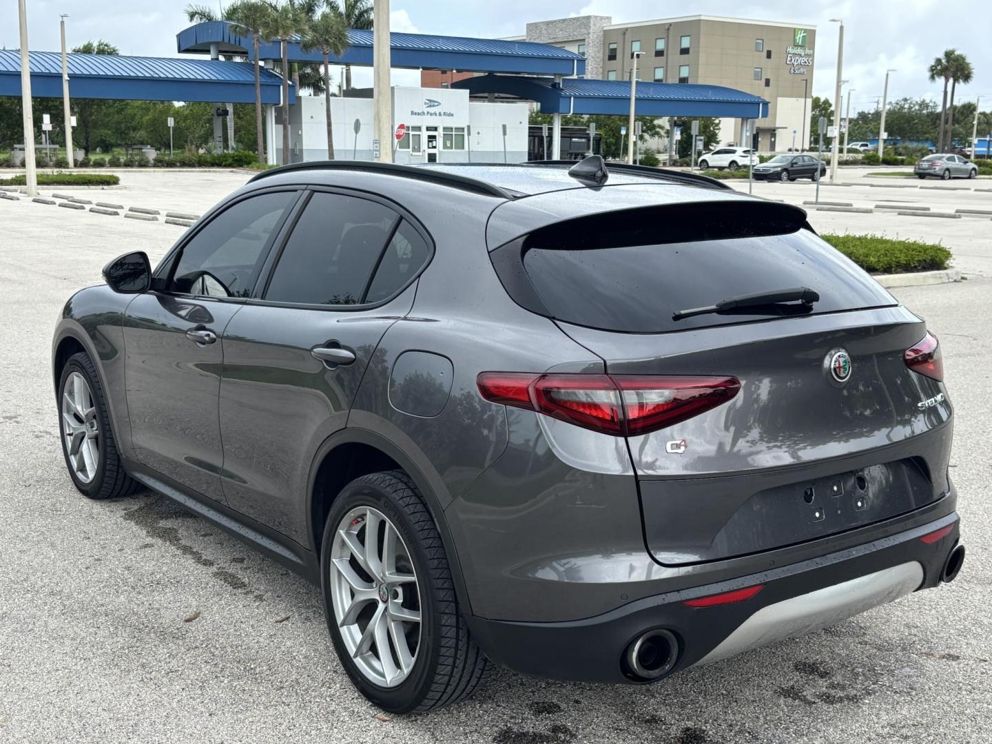 2018 GRAY Alfa Romeo Stelvio Ti Sport (ZASFAKNNXJ7) with an 2.0L L4 DOHC 16V engine, 8A transmission, located at 11170 Summerlin Square Dr., Fort Myers Beach, FL, 33931, (239) 999-7777, 26.493546, -81.941628 - Carfax No Accident No Damage Prior Certified Pre Owned 2018 Alfa Romeo Stelvio Ti Sport - Photo#4