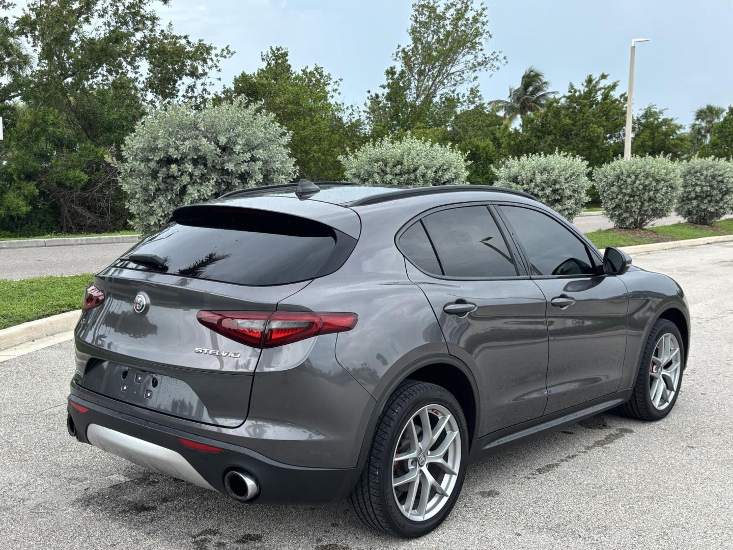 2018 GRAY Alfa Romeo Stelvio Ti Sport (ZASFAKNNXJ7) with an 2.0L L4 DOHC 16V engine, 8A transmission, located at 11170 Summerlin Square Dr., Fort Myers Beach, FL, 33931, (239) 999-7777, 26.493546, -81.941628 - Carfax No Accident No Damage Prior Certified Pre Owned 2018 Alfa Romeo Stelvio Ti Sport - Photo#6