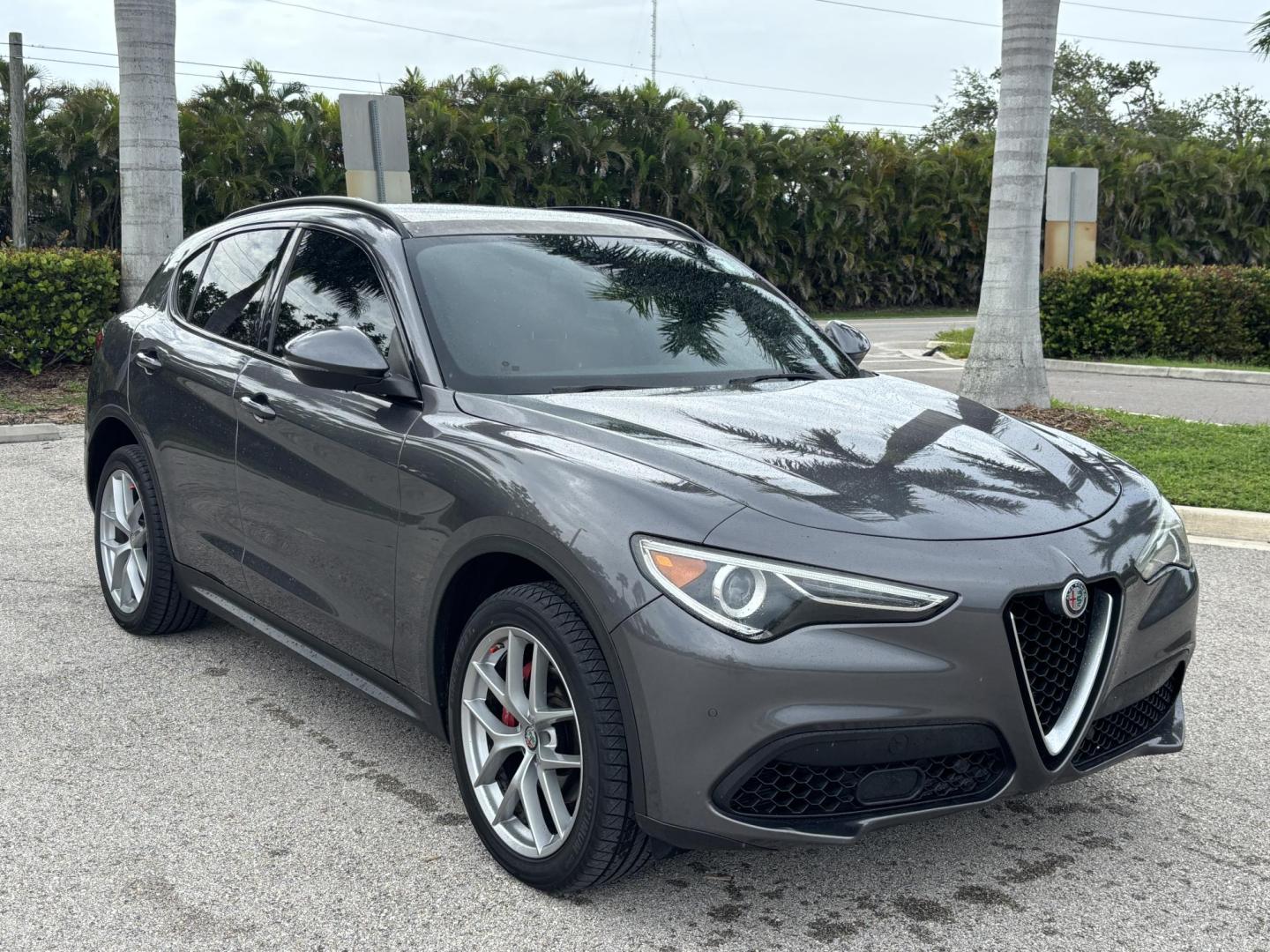 2018 GRAY Alfa Romeo Stelvio Ti Sport (ZASFAKNNXJ7) with an 2.0L L4 DOHC 16V engine, 8A transmission, located at 11170 Summerlin Square Dr., Fort Myers Beach, FL, 33931, (239) 999-7777, 26.493546, -81.941628 - Carfax No Accident No Damage Prior Certified Pre Owned 2018 Alfa Romeo Stelvio Ti Sport - Photo#2