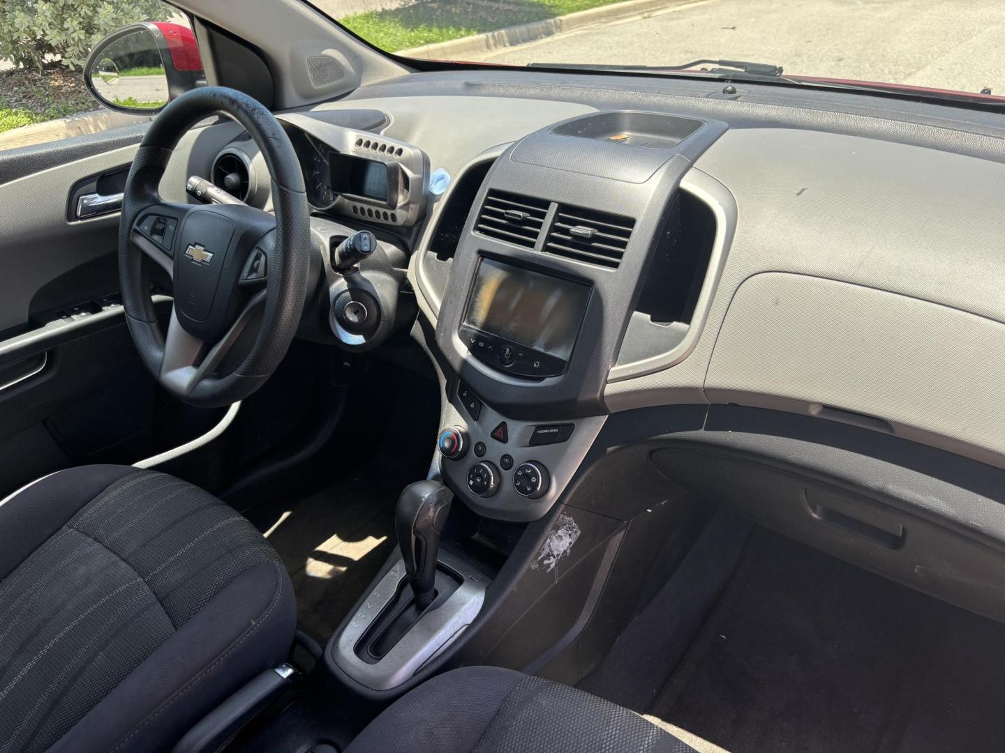 2013 RED Chevrolet Sonic LT Auto 5-Door (1G1JC6SH1D4) with an 1.8L L4 DOHC 24V FFV engine, 6-Speed Automatic transmission, located at 11170 Summerlin Square Dr., Fort Myers Beach, FL, 33931, (239) 999-7777, 26.493546, -81.941628 - Photo#6