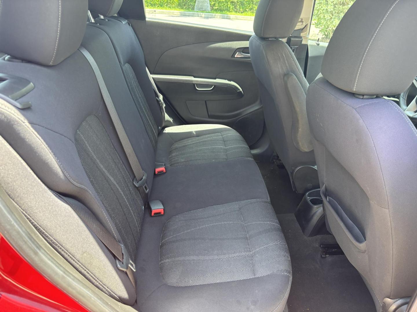 2013 RED Chevrolet Sonic LT Auto 5-Door (1G1JC6SH1D4) with an 1.8L L4 DOHC 24V FFV engine, 6-Speed Automatic transmission, located at 11170 Summerlin Square Dr., Fort Myers Beach, FL, 33931, (239) 999-7777, 26.493546, -81.941628 - Photo#8
