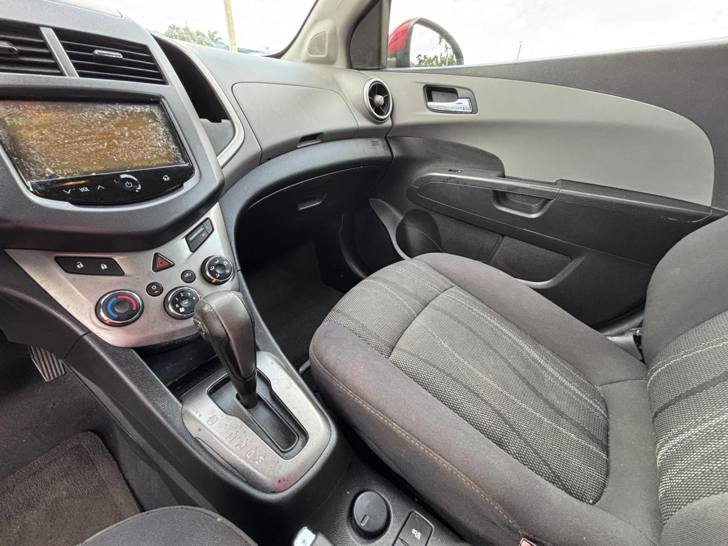 2013 RED /DARK GRAY Chevrolet Sonic LT Auto 5-Door (1G1JC6SH1D4) with an 1.8L L4 DOHC 24V FFV engine, 6-Speed Automatic transmission, located at 11170 Summerlin Square Dr., Fort Myers Beach, FL, 33931, (239) 999-7777, 26.493546, -81.941628 - We have financing available and we accept trades! Fill out a credit application on our website or come by today! If you have any questions, give us a call at (239) 999 - 7777 or visit our website at firstautocredit.com. 11170 Summerlin Square Dr, Fort Myers Beach, FL 33931 Carfax 2 Owner M - Photo#9