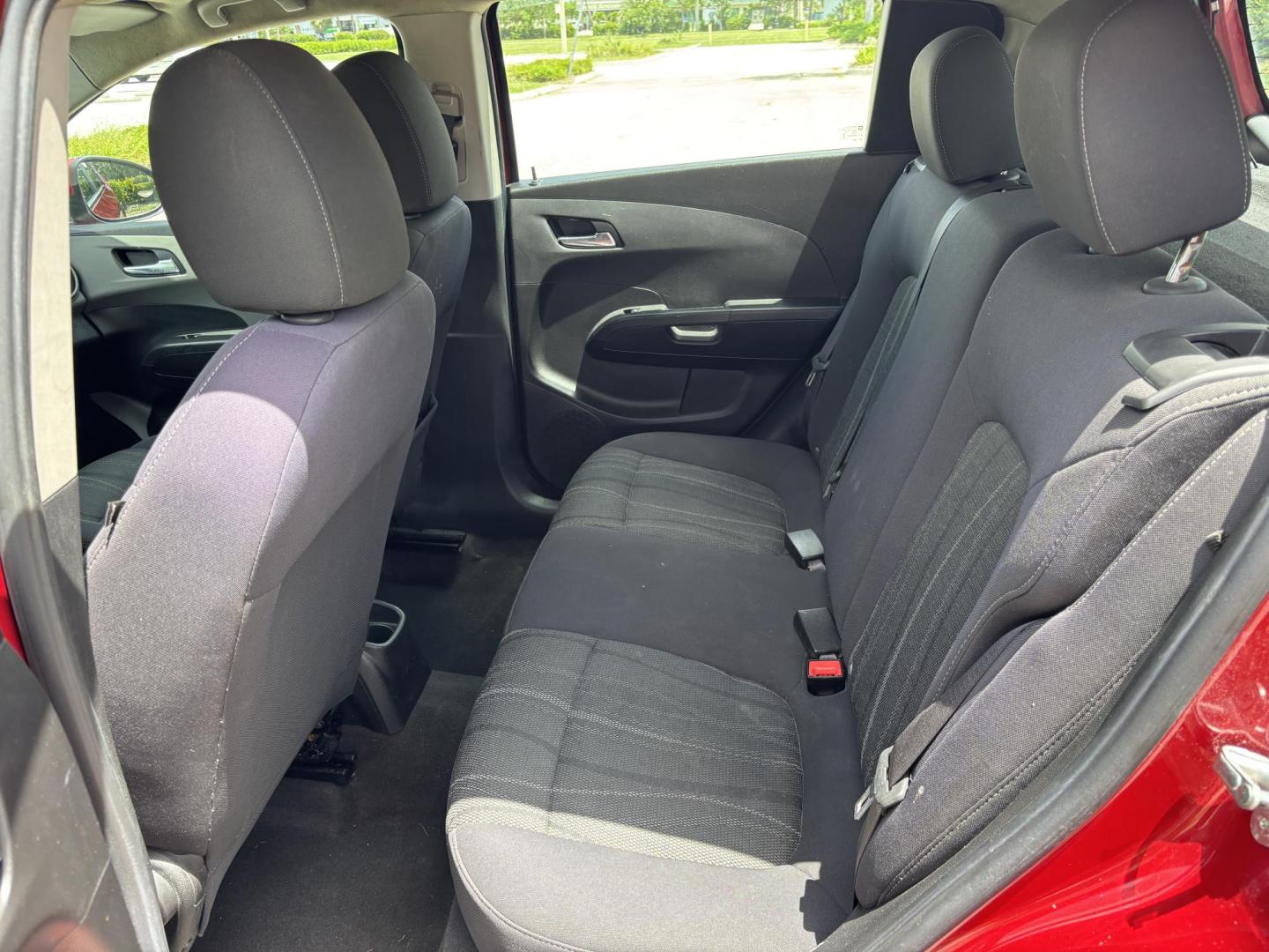 2013 RED /DARK GRAY Chevrolet Sonic LT Auto 5-Door (1G1JC6SH1D4) with an 1.8L L4 DOHC 24V FFV engine, 6-Speed Automatic transmission, located at 11170 Summerlin Square Dr., Fort Myers Beach, FL, 33931, (239) 999-7777, 26.493546, -81.941628 - We have financing available and we accept trades! Fill out a credit application on our website or come by today! If you have any questions, give us a call at (239) 999 - 7777 or visit our website at firstautocredit.com. 11170 Summerlin Square Dr, Fort Myers Beach, FL 33931 Carfax 2 Owner M - Photo#12