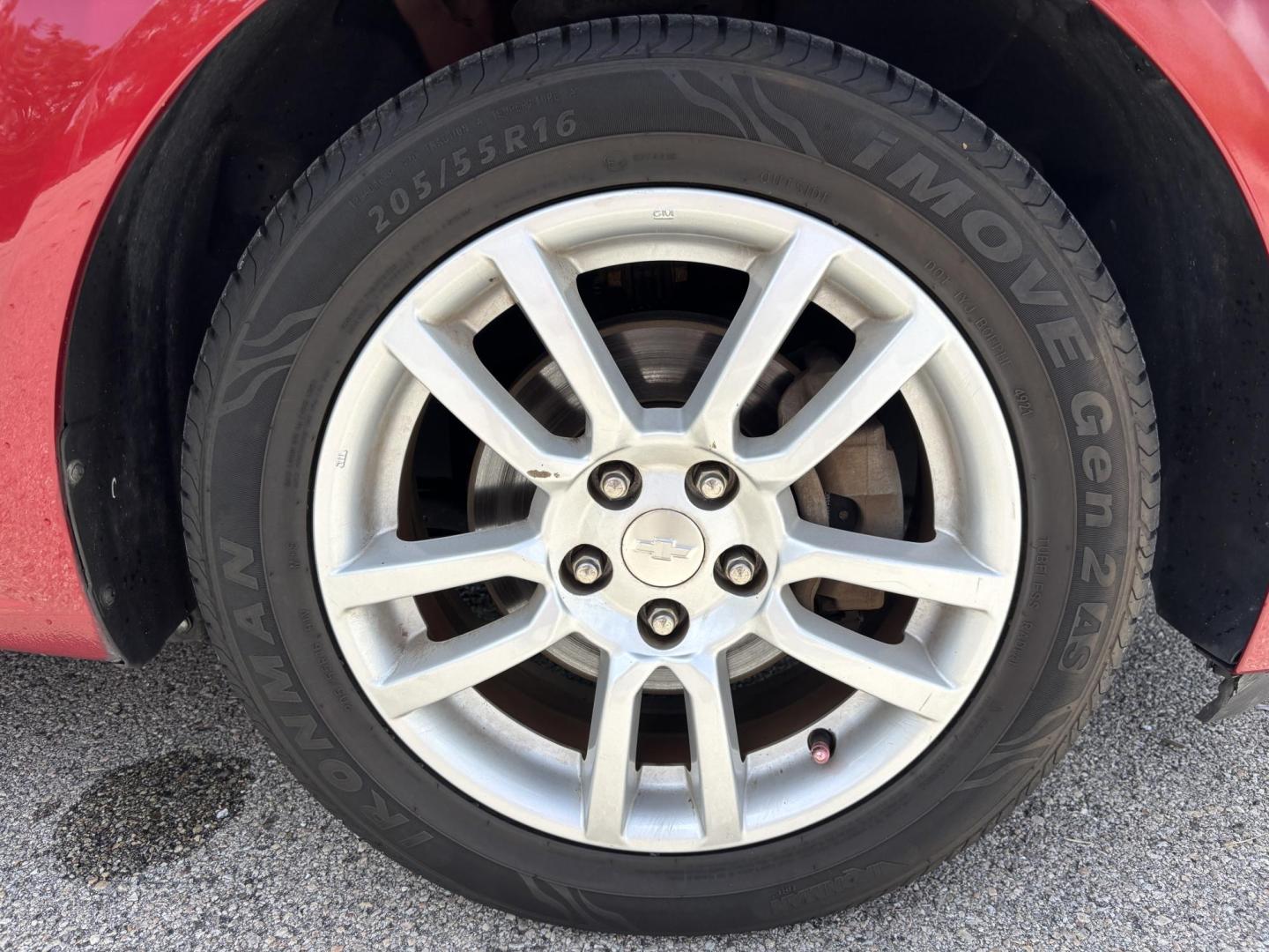 2013 RED /DARK GRAY Chevrolet Sonic LT Auto 5-Door (1G1JC6SH1D4) with an 1.8L L4 DOHC 24V FFV engine, 6-Speed Automatic transmission, located at 11170 Summerlin Square Dr., Fort Myers Beach, FL, 33931, (239) 999-7777, 26.493546, -81.941628 - We have financing available and we accept trades! Fill out a credit application on our website or come by today! If you have any questions, give us a call at (239) 999 - 7777 or visit our website at firstautocredit.com. 11170 Summerlin Square Dr, Fort Myers Beach, FL 33931 Carfax 2 Owner M - Photo#27