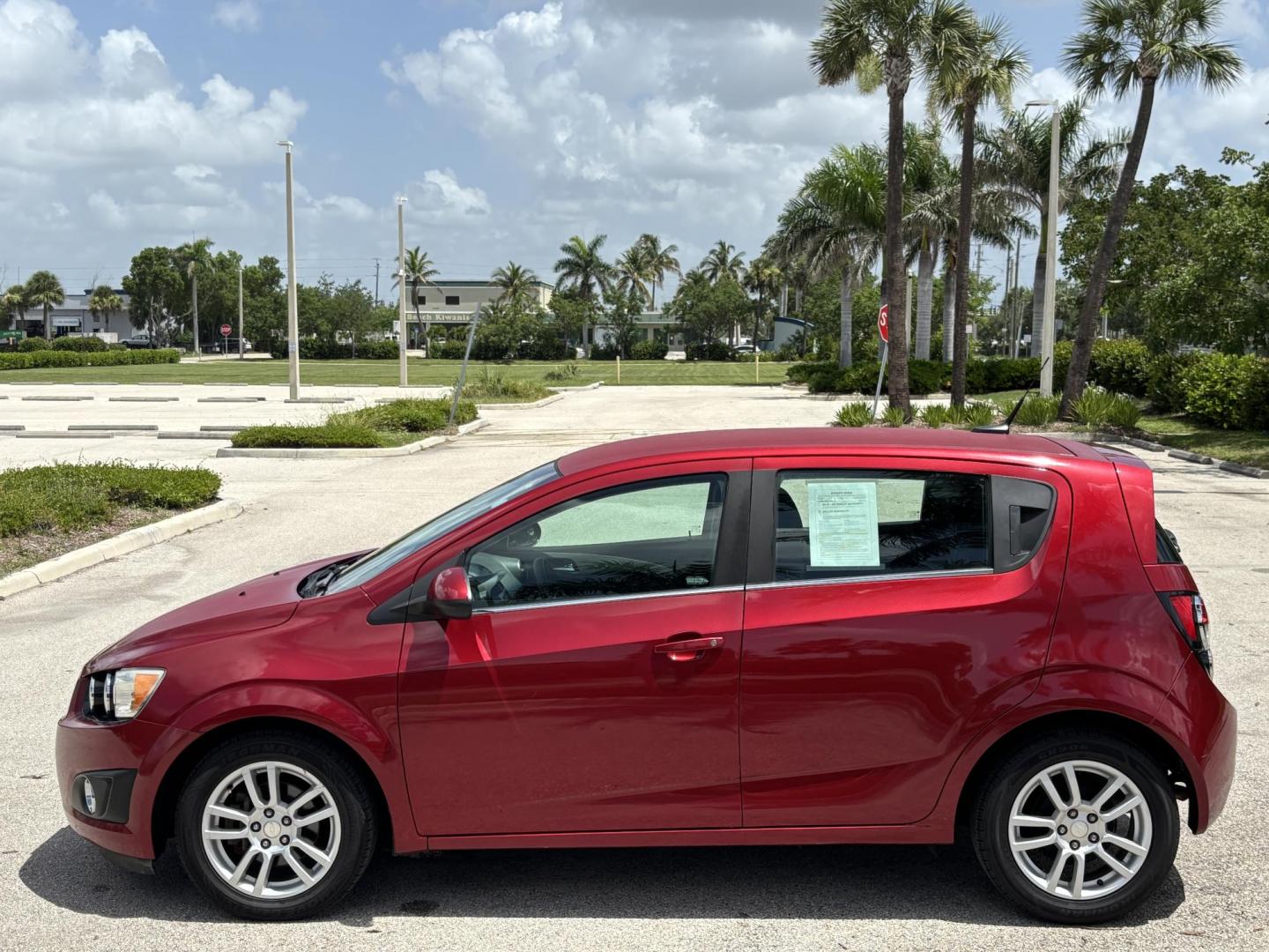 2013 RED /DARK GRAY Chevrolet Sonic LT Auto 5-Door (1G1JC6SH1D4) with an 1.8L L4 DOHC 24V FFV engine, 6-Speed Automatic transmission, located at 11170 Summerlin Square Dr., Fort Myers Beach, FL, 33931, (239) 999-7777, 26.493546, -81.941628 - We have financing available and we accept trades! Fill out a credit application on our website or come by today! If you have any questions, give us a call at (239) 999 - 7777 or visit our website at firstautocredit.com. 11170 Summerlin Square Dr, Fort Myers Beach, FL 33931 Carfax 2 Owner M - Photo#7