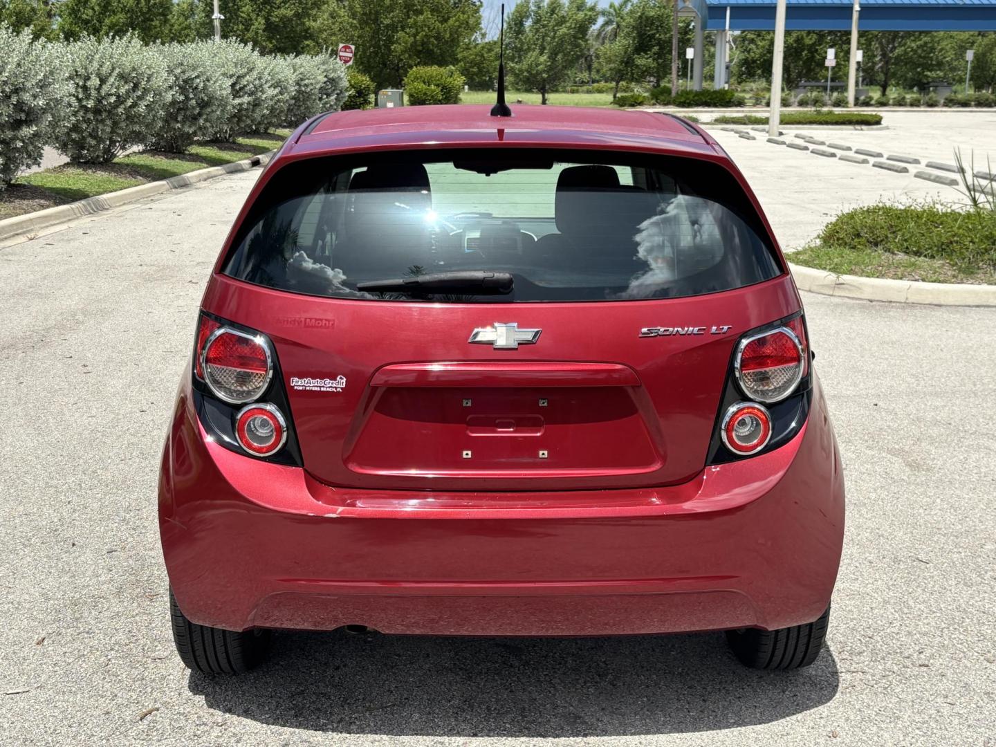 2013 RED /DARK GRAY Chevrolet Sonic LT Auto 5-Door (1G1JC6SH1D4) with an 1.8L L4 DOHC 24V FFV engine, 6-Speed Automatic transmission, located at 11170 Summerlin Square Dr., Fort Myers Beach, FL, 33931, (239) 999-7777, 26.493546, -81.941628 - We have financing available and we accept trades! Fill out a credit application on our website or come by today! If you have any questions, give us a call at (239) 999 - 7777 or visit our website at firstautocredit.com. 11170 Summerlin Square Dr, Fort Myers Beach, FL 33931 Carfax 2 Owner M - Photo#5