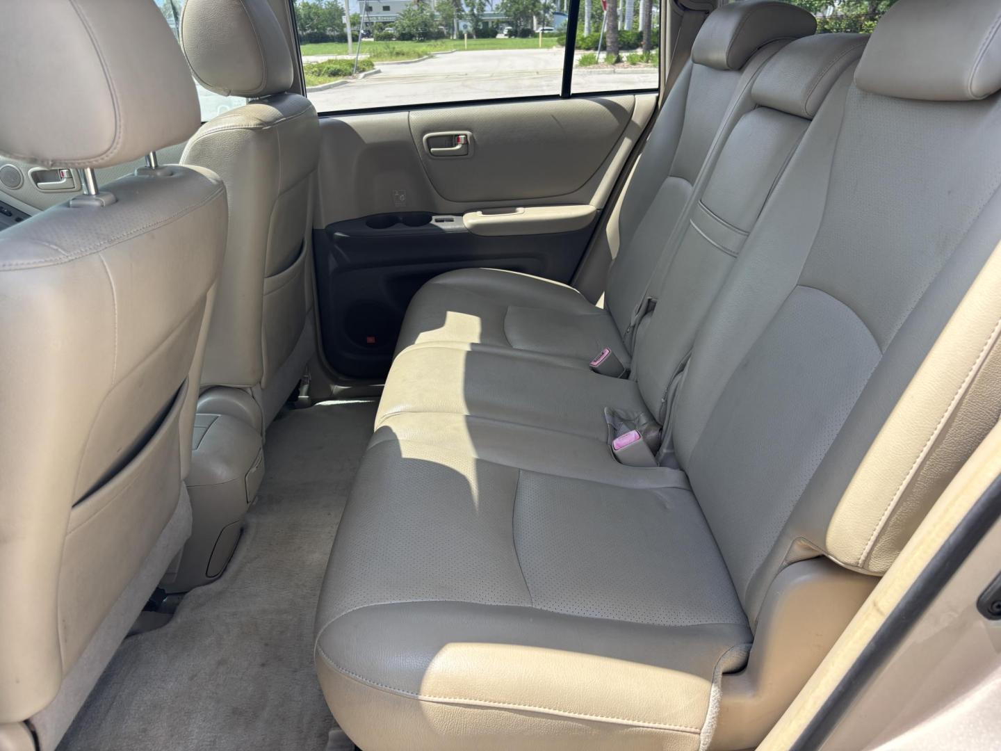 2007 GOLD Toyota Highlander Hybrid 2WD (JTEGW21A570) with an 3.3L V6 DOHC 24V HYBRID engine, CVT transmission, located at 11170 Summerlin Square Dr., Fort Myers Beach, FL, 33931, (239) 999-7777, 26.493546, -81.941628 - Photo#12