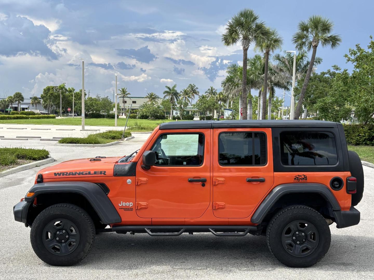 2018 ORANGE Jeep Wrangler Unlimited Sport (1C4HJXDN1JW) with an 2.0L L4 DOHC 16V TURBO engine, 6A transmission, located at 11170 Summerlin Square Dr., Fort Myers Beach, FL, 33931, (239) 999-7777, 26.493546, -81.941628 - Photo#7