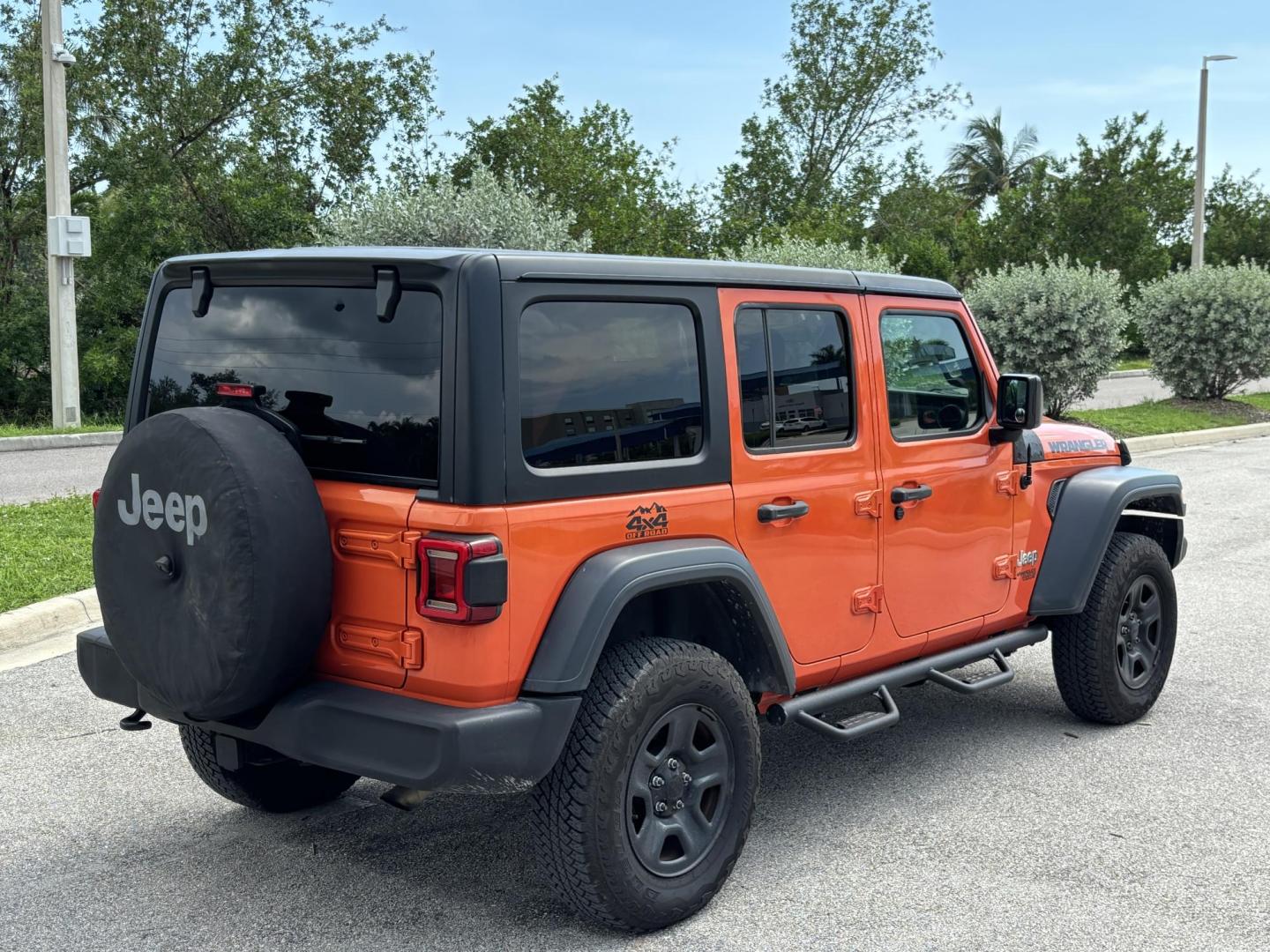 2018 ORANGE Jeep Wrangler Unlimited Sport (1C4HJXDN1JW) with an 2.0L L4 DOHC 16V TURBO engine, 6A transmission, located at 11170 Summerlin Square Dr., Fort Myers Beach, FL, 33931, (239) 999-7777, 26.493546, -81.941628 - Photo#6