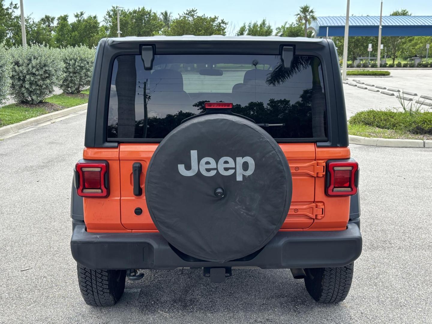2018 ORANGE Jeep Wrangler Unlimited Sport (1C4HJXDN1JW) with an 2.0L L4 DOHC 16V TURBO engine, 6A transmission, located at 11170 Summerlin Square Dr., Fort Myers Beach, FL, 33931, (239) 999-7777, 26.493546, -81.941628 - Photo#5