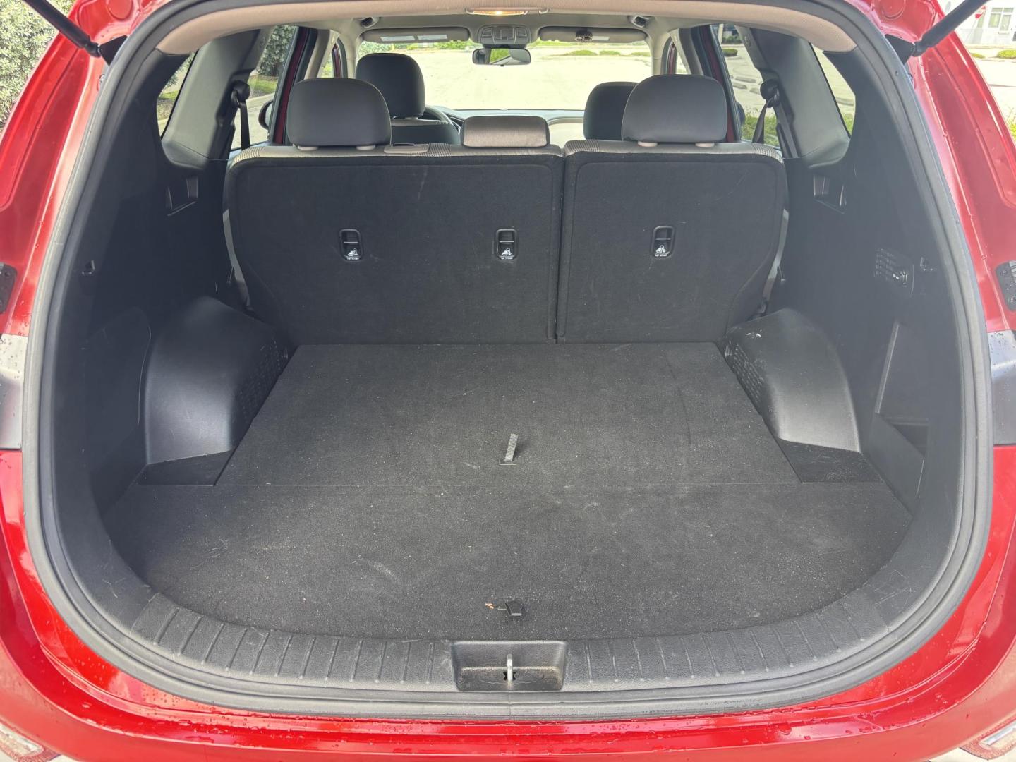 2019 RED Hyundai Santa Fe SE 2.4 (5NMS23AD9KH) with an 2.4L L4 DOHC 16V engine, 8A transmission, located at 11170 Summerlin Square Dr., Fort Myers Beach, FL, 33931, (239) 999-7777, 26.493546, -81.941628 - Photo#36