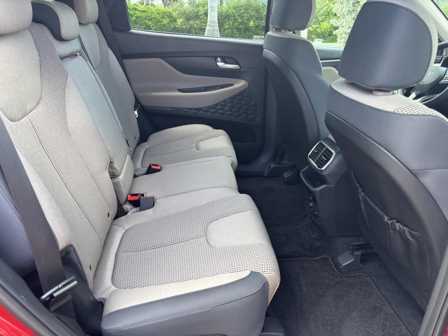 2019 RED Hyundai Santa Fe SE 2.4 (5NMS23AD9KH) with an 2.4L L4 DOHC 16V engine, 8A transmission, located at 11170 Summerlin Square Dr., Fort Myers Beach, FL, 33931, (239) 999-7777, 26.493546, -81.941628 - Photo#14
