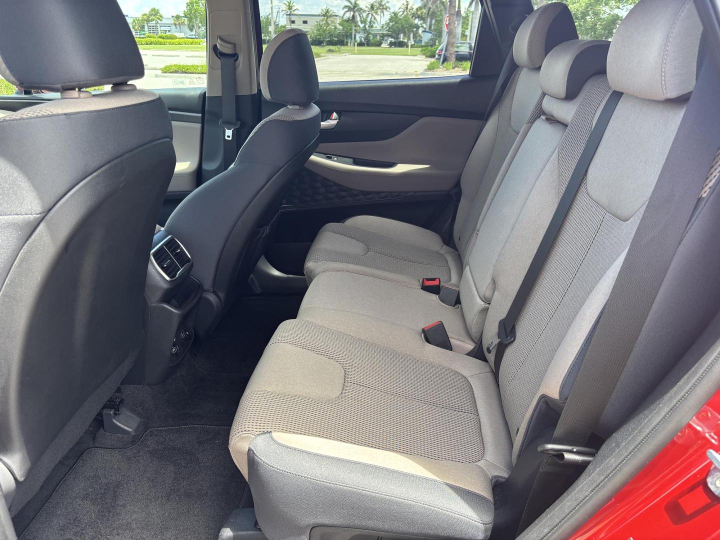 2019 RED Hyundai Santa Fe SE 2.4 (5NMS23AD9KH) with an 2.4L L4 DOHC 16V engine, 8A transmission, located at 11170 Summerlin Square Dr., Fort Myers Beach, FL, 33931, (239) 999-7777, 26.493546, -81.941628 - Photo#17