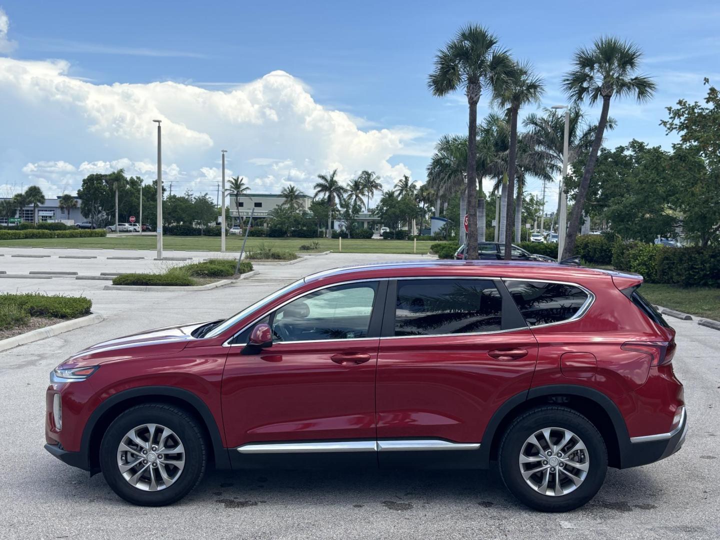 2019 RED Hyundai Santa Fe SE 2.4 (5NMS23AD9KH) with an 2.4L L4 DOHC 16V engine, 8A transmission, located at 11170 Summerlin Square Dr., Fort Myers Beach, FL, 33931, (239) 999-7777, 26.493546, -81.941628 - Photo#7