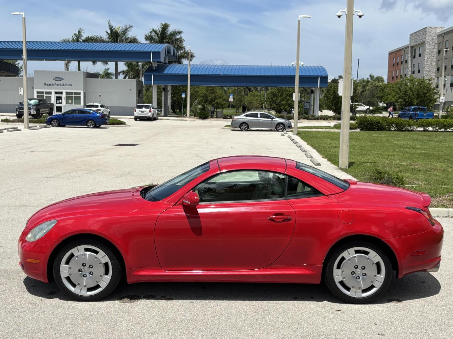 2002 RED /BEIGE Lexus SC 430 Convertible (JTHFN48Y120) with an 4.3L V8 DOHC 32V engine, 5-Speed Automatic Overdrive transmission, located at 11170 Summerlin Square Dr., Fort Myers Beach, FL, 33931, (239) 999-7777, 26.493546, -81.941628 - Carfax Value $12,400 Local Florida Vehicle 37 Service History Records - Photo#16